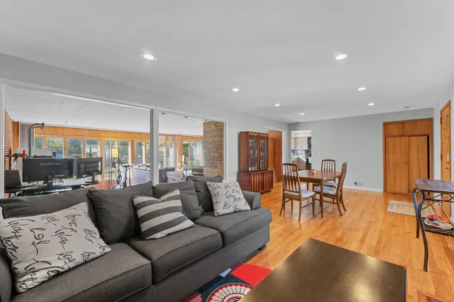a living room with furniture and a table