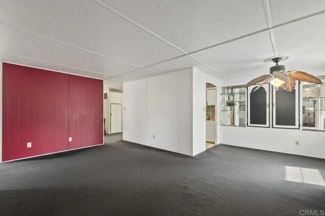 a view of a livingroom with furniture