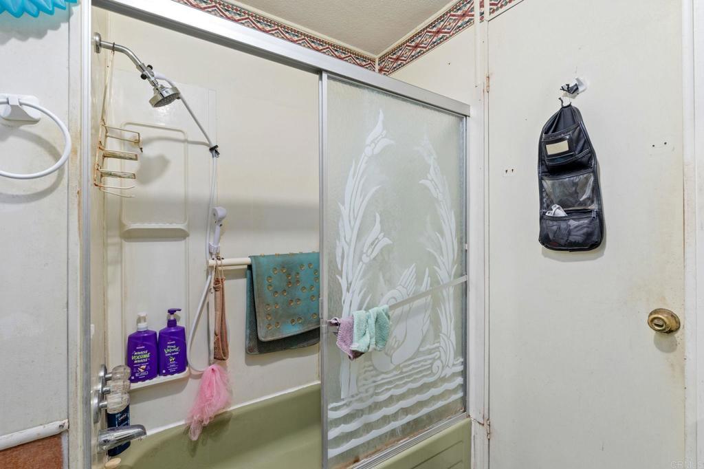 28890 Lilac Road, Unit 119 Valley Center, CA 92082 - Photo 10 of 16 a bathroom with a shower