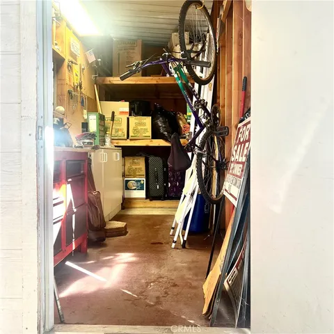 a view of living room with furniture and a fireplace