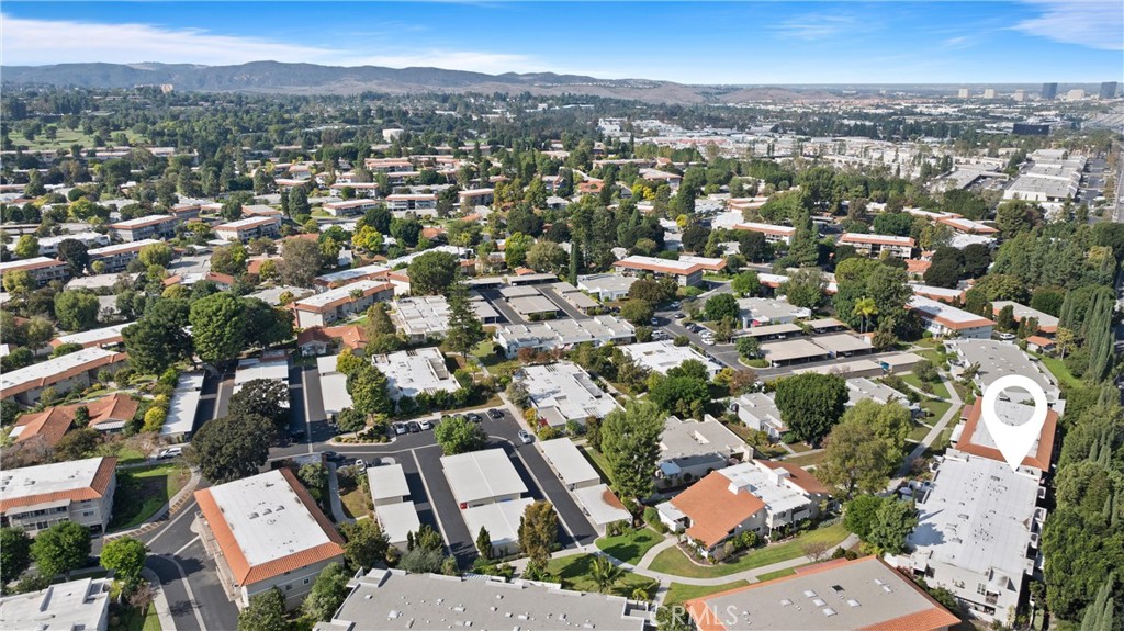 2121 Ronda Granada, Unit N Laguna Woods, CA 92637 - Photo 35 of 38 an aerial view of residential houses with outdoor space