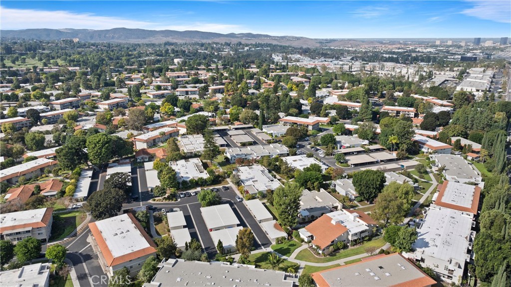 2121 Ronda Granada, Unit N Laguna Woods, CA 92637 - Photo 36 of 38 an aerial view of residential houses with outdoor space