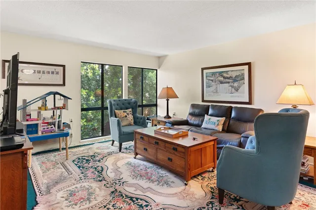 a living room with a couch and a table