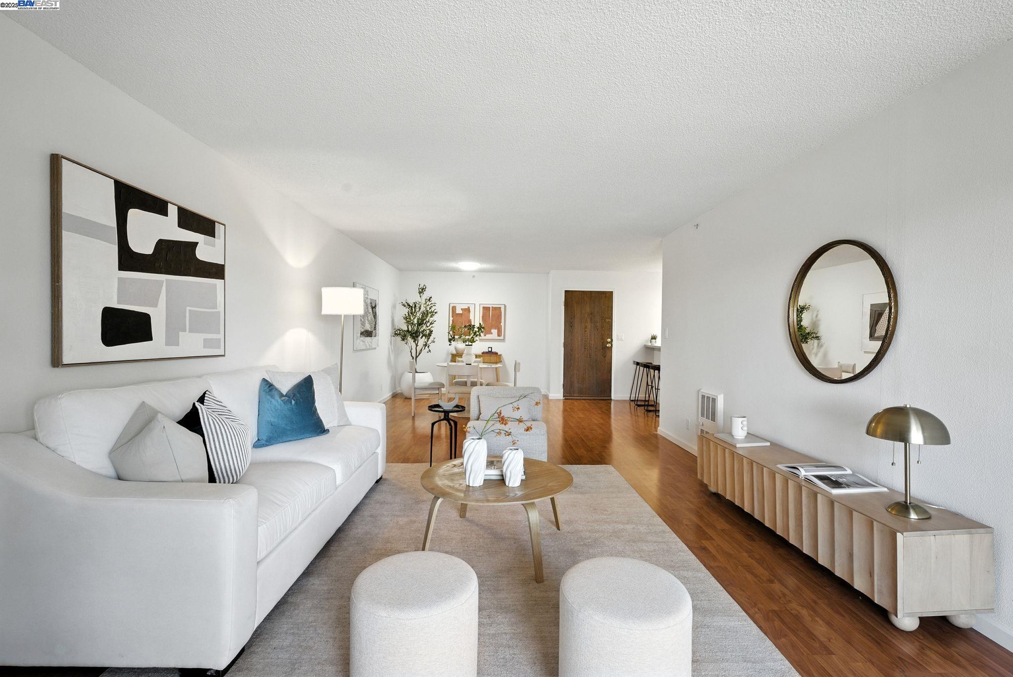 332 Philip Drive, Unit 303 Daly City, CA 94015 - Photo 4 of 55 a living room with furniture a mirror and a window