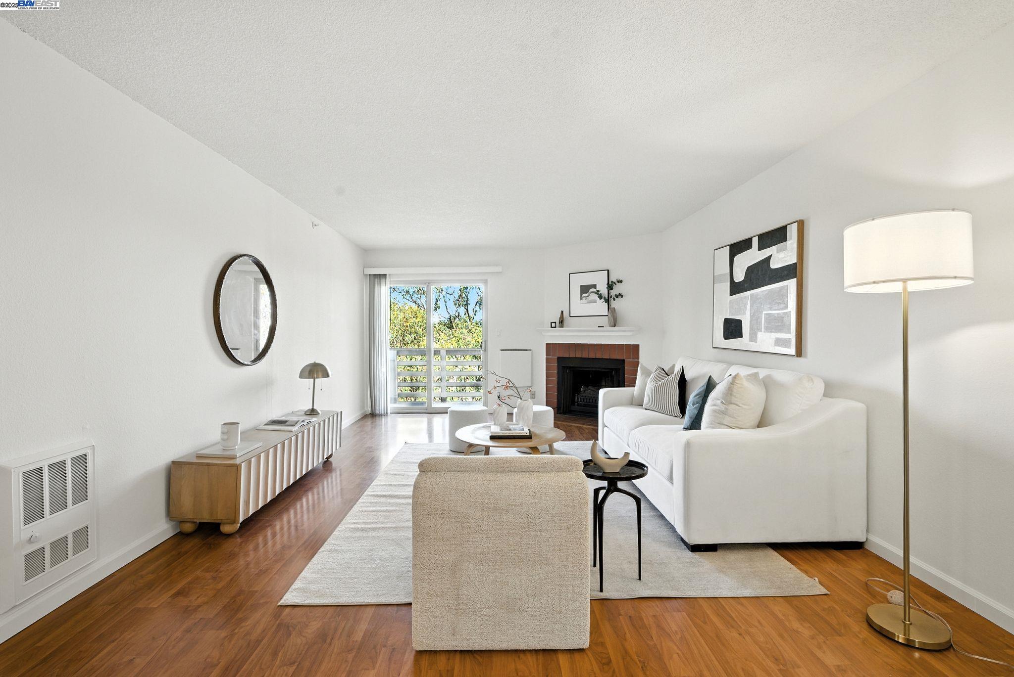 332 Philip Drive, Unit 303 Daly City, CA 94015 - Photo 5 of 55 a living room with furniture and a fireplace