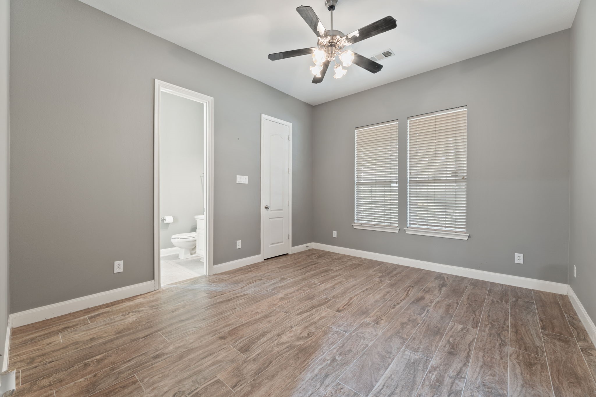 13506 Key Ridge Lane Cypress, TX 77429 - Photo 29 of 49 wooden floor in an empty room with a window
