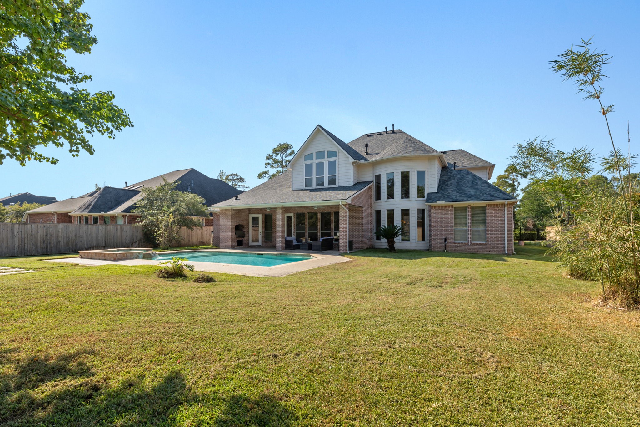 13506 Key Ridge Lane Cypress, TX 77429 - Photo 39 of 49 a front view of a house with swimming pool having outdoor seating