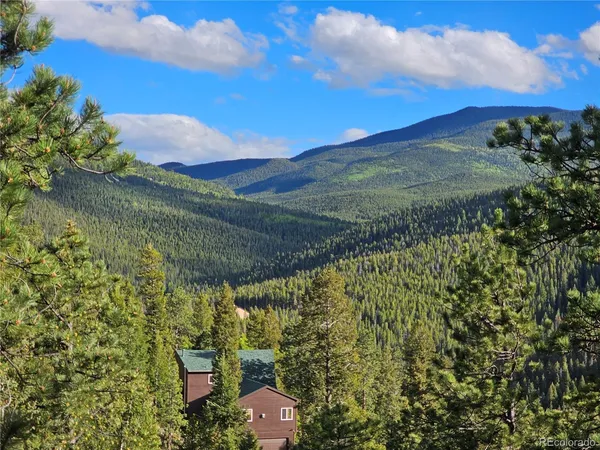 a view of a lake with a mountain in the background