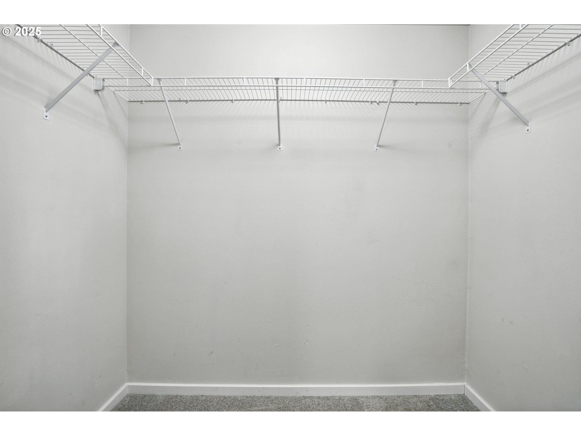 1608 Northwest 3rd Street Battle Ground, WA 98604 - Photo 19 of 26 a view of a room with racks on the wall