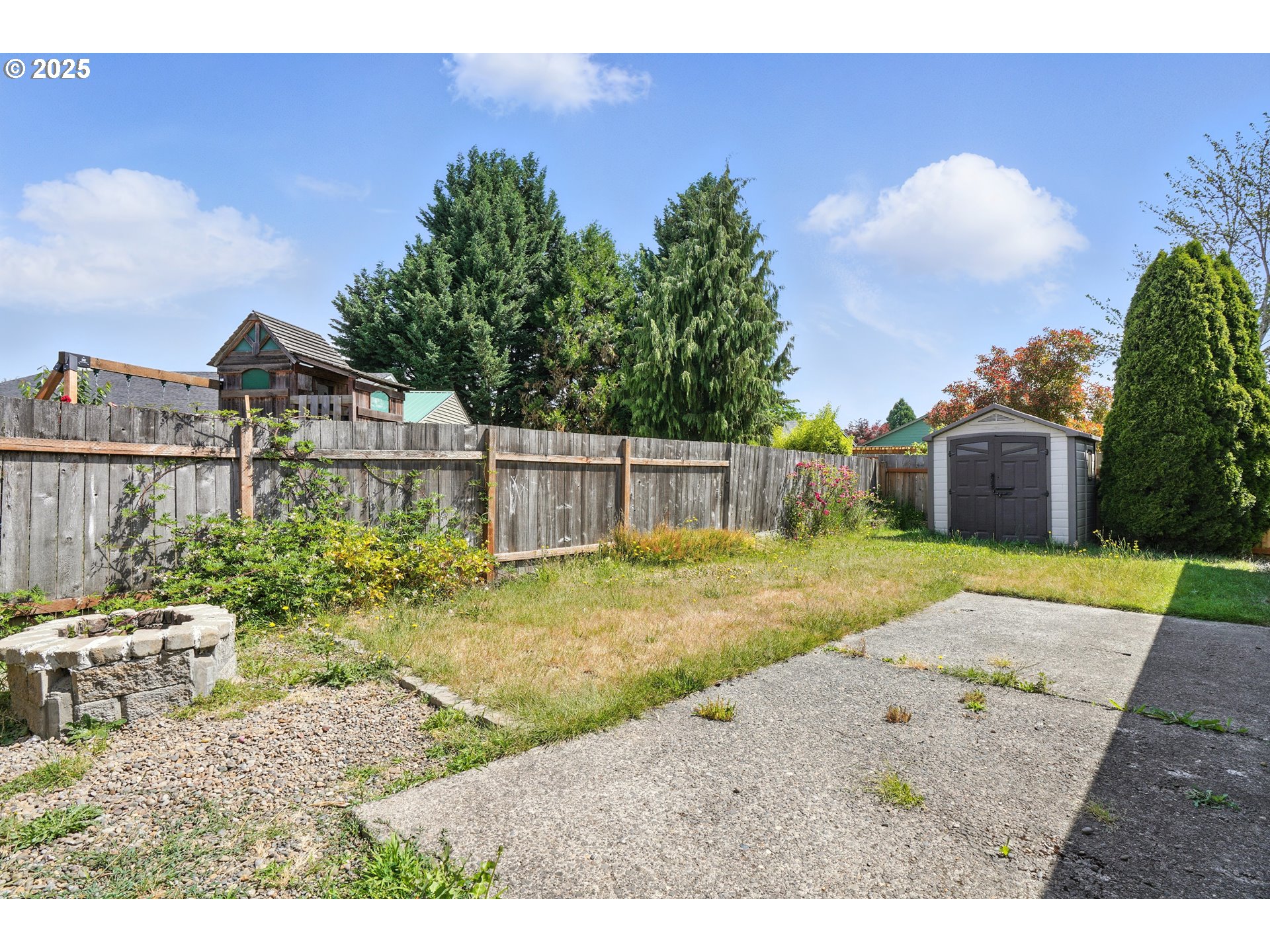 1608 Northwest 3rd Street Battle Ground, WA 98604 - Photo 21 of 26 a view of a backyard and a house