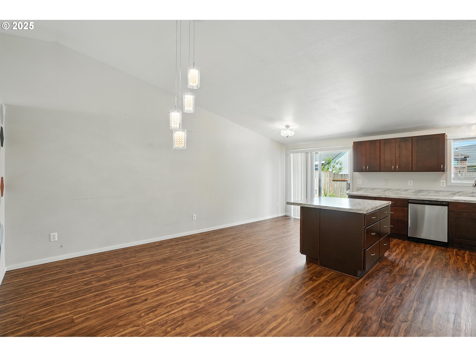 1608 Northwest 3rd Street Battle Ground, WA 98604 - Photo 7 of 26 a view of kitchen with wooden floor