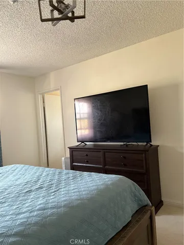 a living room with a bed