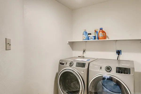 a utility room with dryer and washer