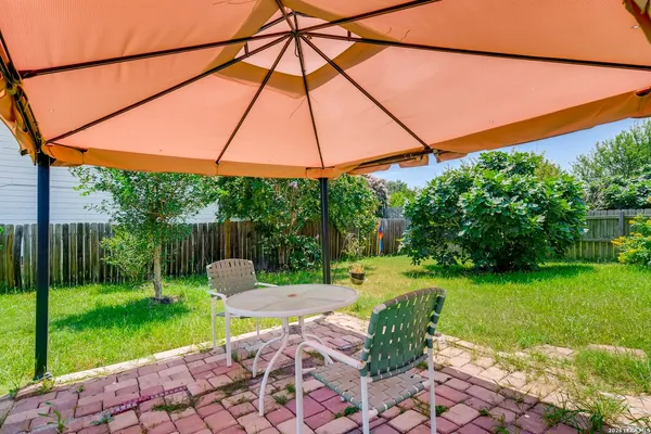 a backyard of a house with seating space
