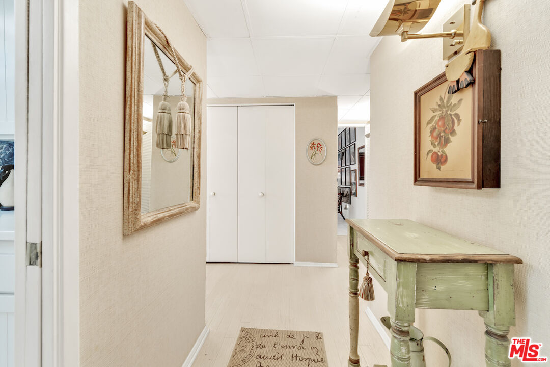 2385 Roscomare Road, Unit D17 Los Angeles, CA 90077 - Photo 2 of 22 a view of hallway with stairs and furniture
