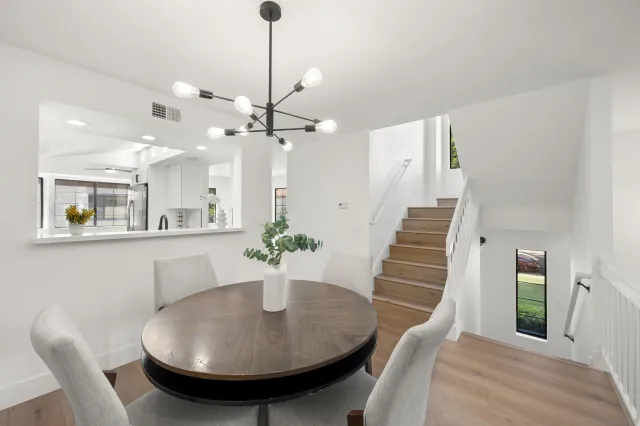 a view of a dining room with furniture