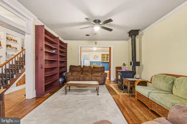 a living room with furniture and a table