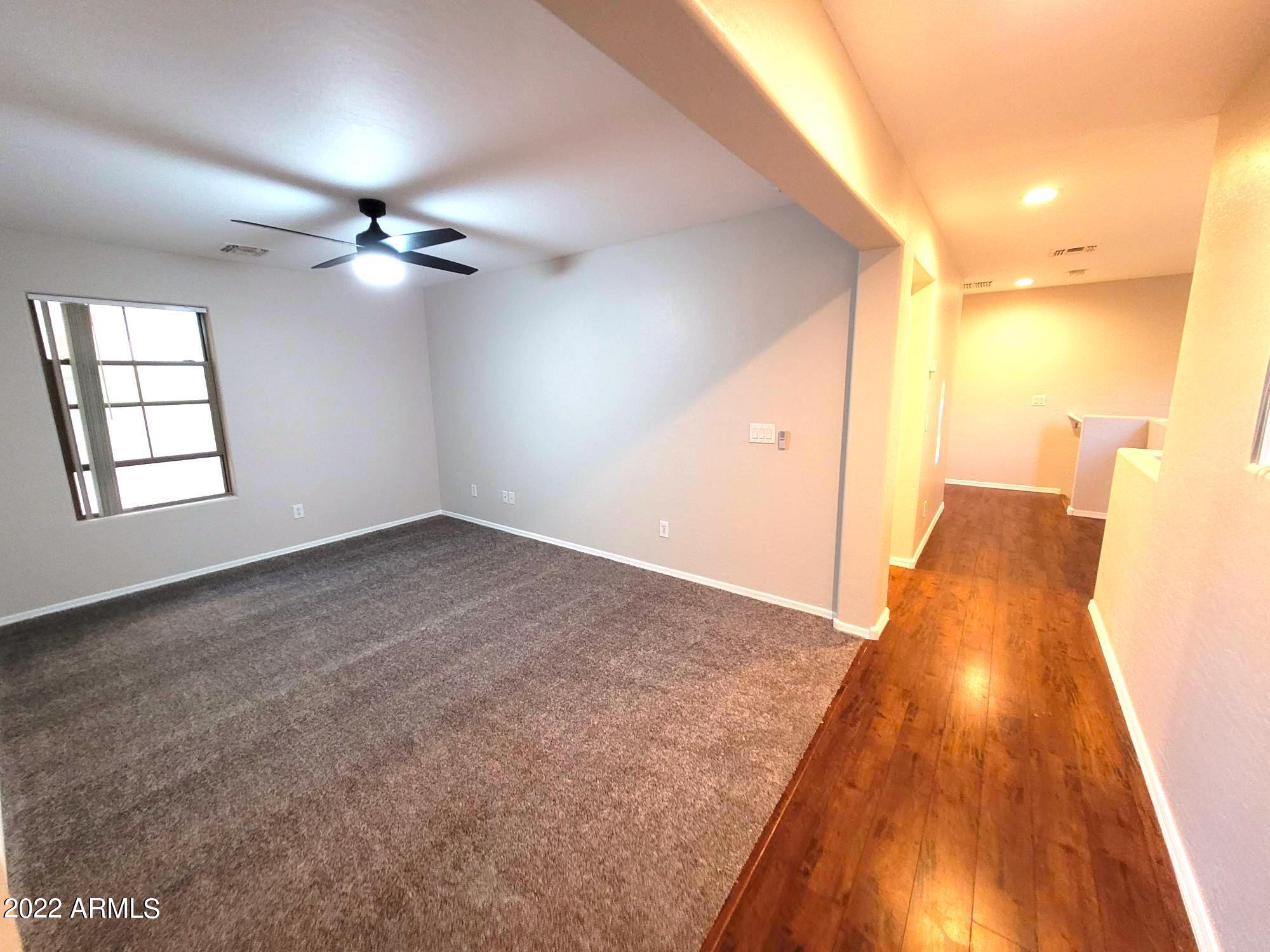 1930 East Harrison Street Gilbert, AZ 85295 - Photo 19 of 31 wooden floor in an empty room with a window