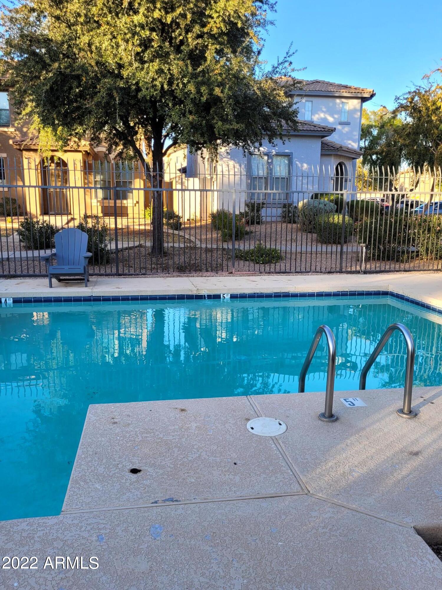 1930 East Harrison Street Gilbert, AZ 85295 - Photo 30 of 31 a view of swimming pool with outdoor seating and plants