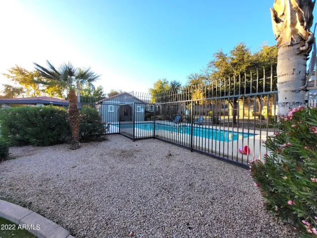 a view of a backyard with a small yard