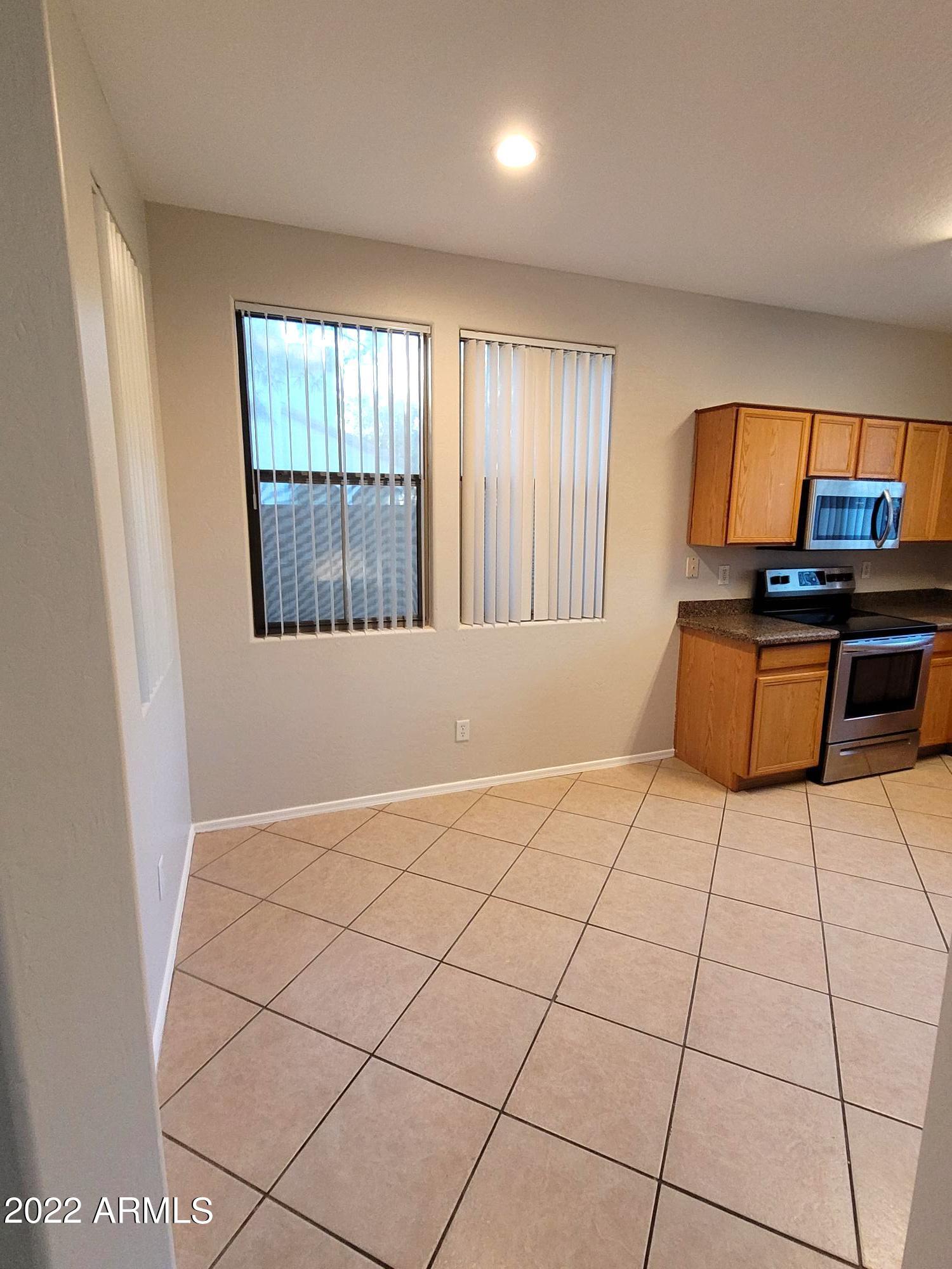 1930 East Harrison Street Gilbert, AZ 85295 - Photo 6 of 31 a view of an empty room with a window