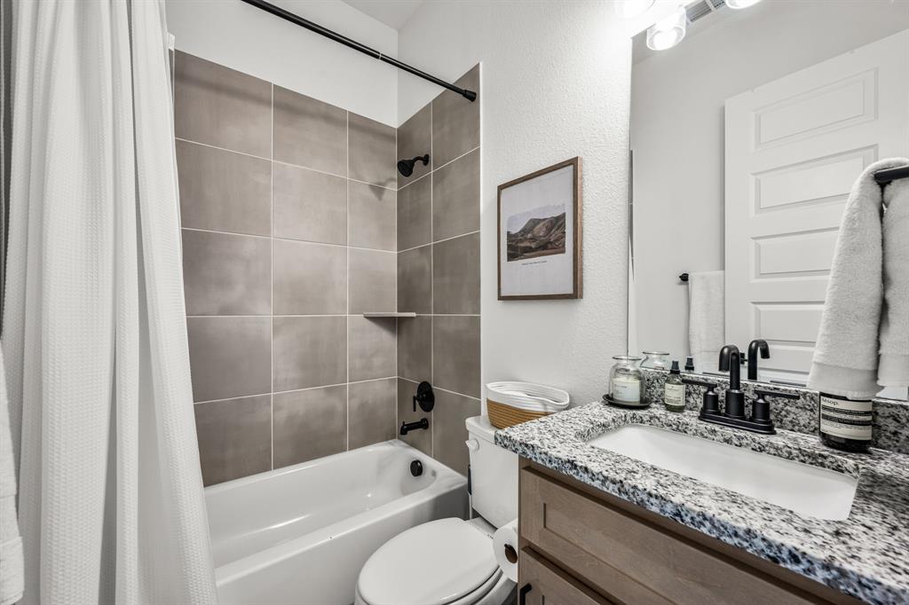 5621 Evans Road The Colony, TX 75056 - Photo 20 of 25 Downstairs Bathroom