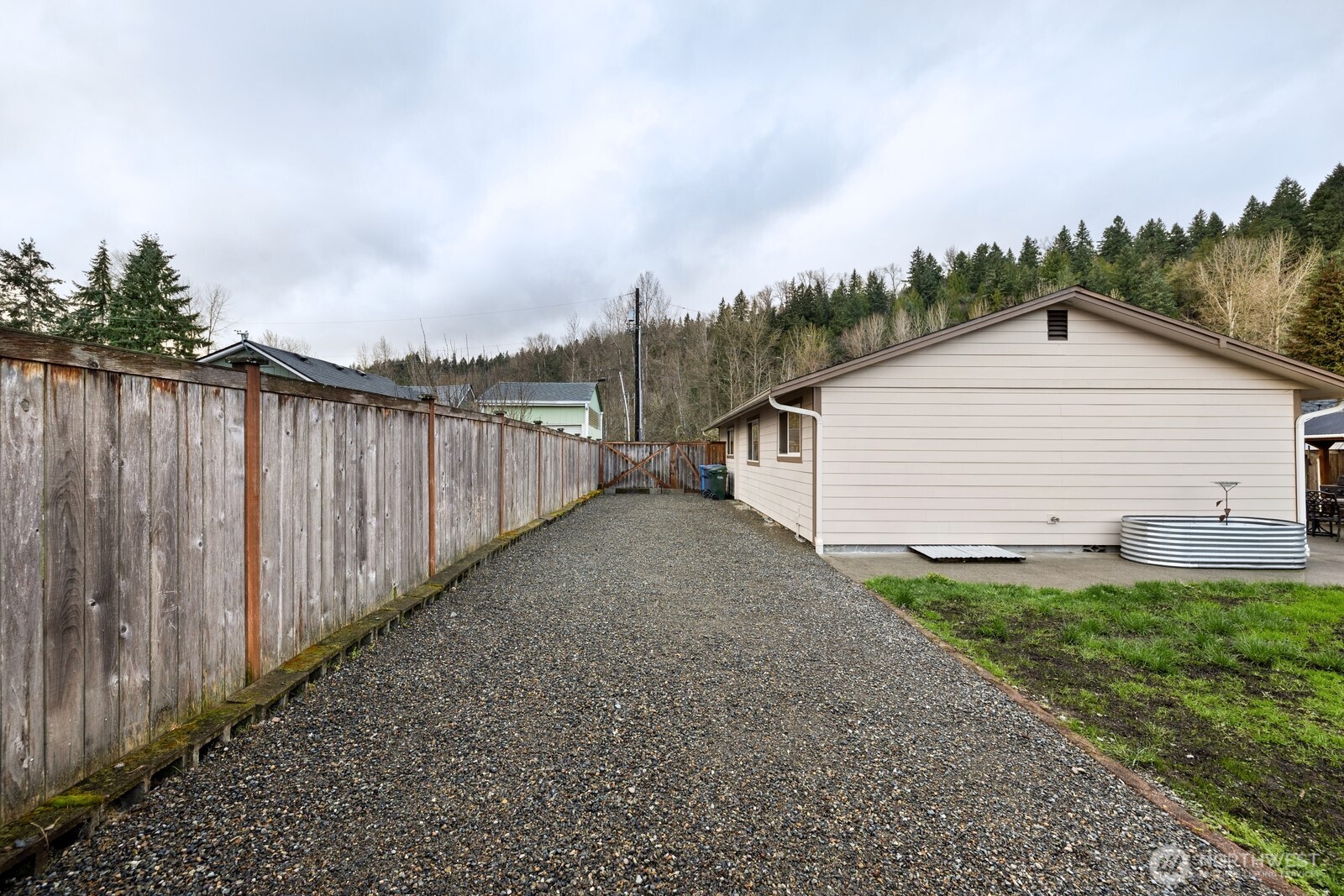 506 Train Street Southeast Orting, WA 98360 - Photo 22 of 24 a view of a backyard of the house