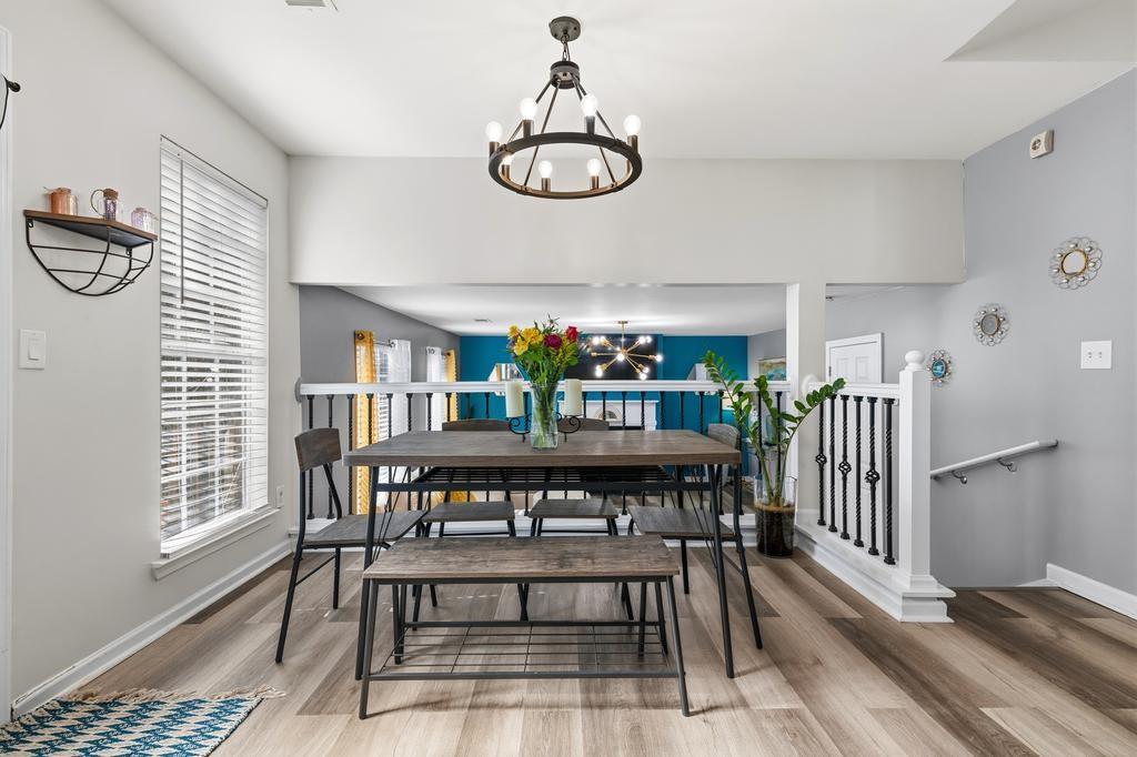 5914 Waggoner Court Rex, GA 30273 - Photo 11 of 21 a view of a dining room with furniture window and wooden floor