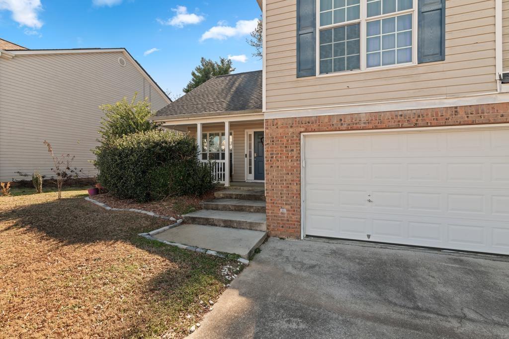 5914 Waggoner Court Rex, GA 30273 - Photo 4 of 21 a view of a house with a yard