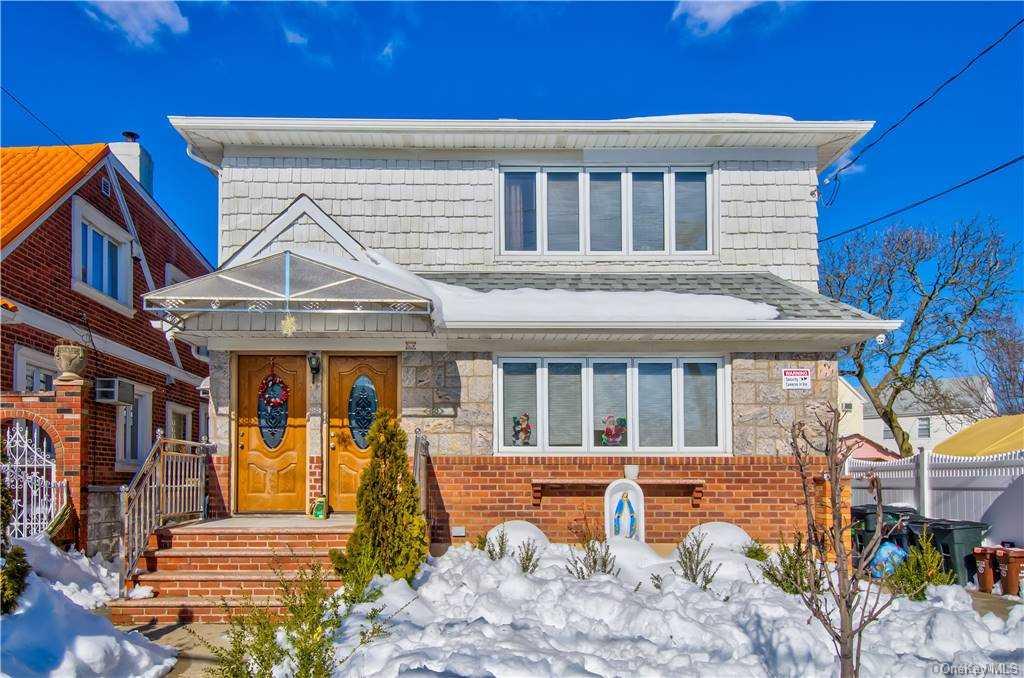 96-09 Linden Boulevard Queens, NY 11417 - Photo 1 of 1 a front view of a house with glass windows