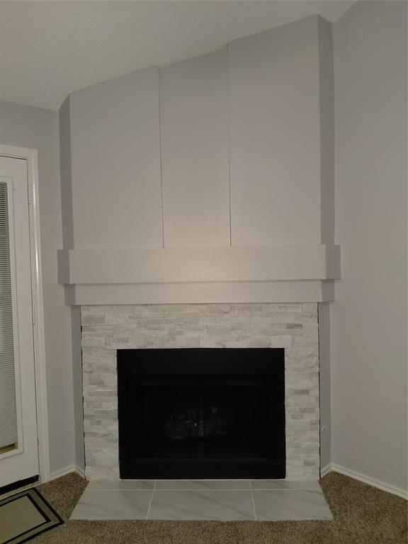 626 Albrook Drive Allen, TX 75002 - Photo 17 of 32 Stunning New Glistening Stacked Stone around Fireplace in Den