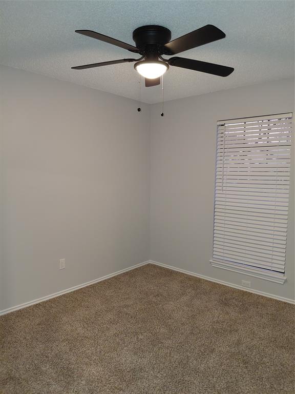 626 Albrook Drive Allen, TX 75002 - Photo 21 of 32 Front Bedroom with New Ceiling Fan
