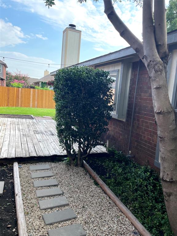 626 Albrook Drive Allen, TX 75002 - Photo 32 of 32 Walkway leading to Deck & Back Yard
