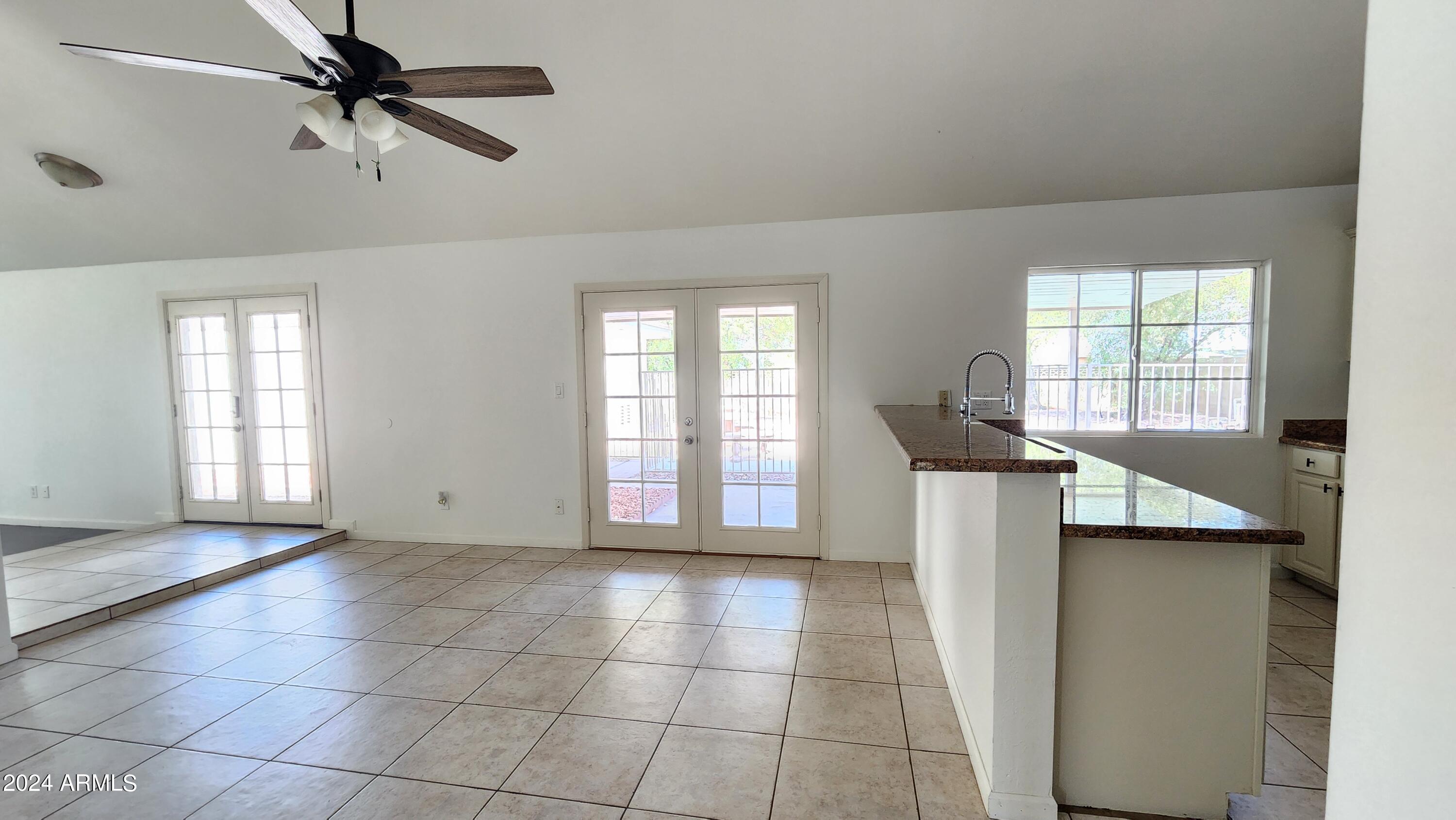 3017 West Yucca Street Phoenix, AZ 85029 - Photo 12 of 32 a view of an empty room with a window