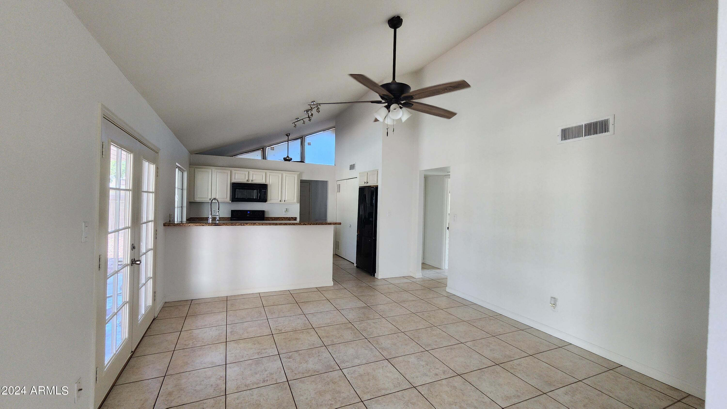 3017 West Yucca Street Phoenix, AZ 85029 - Photo 13 of 32 a view of a kitchen with a sink and a window