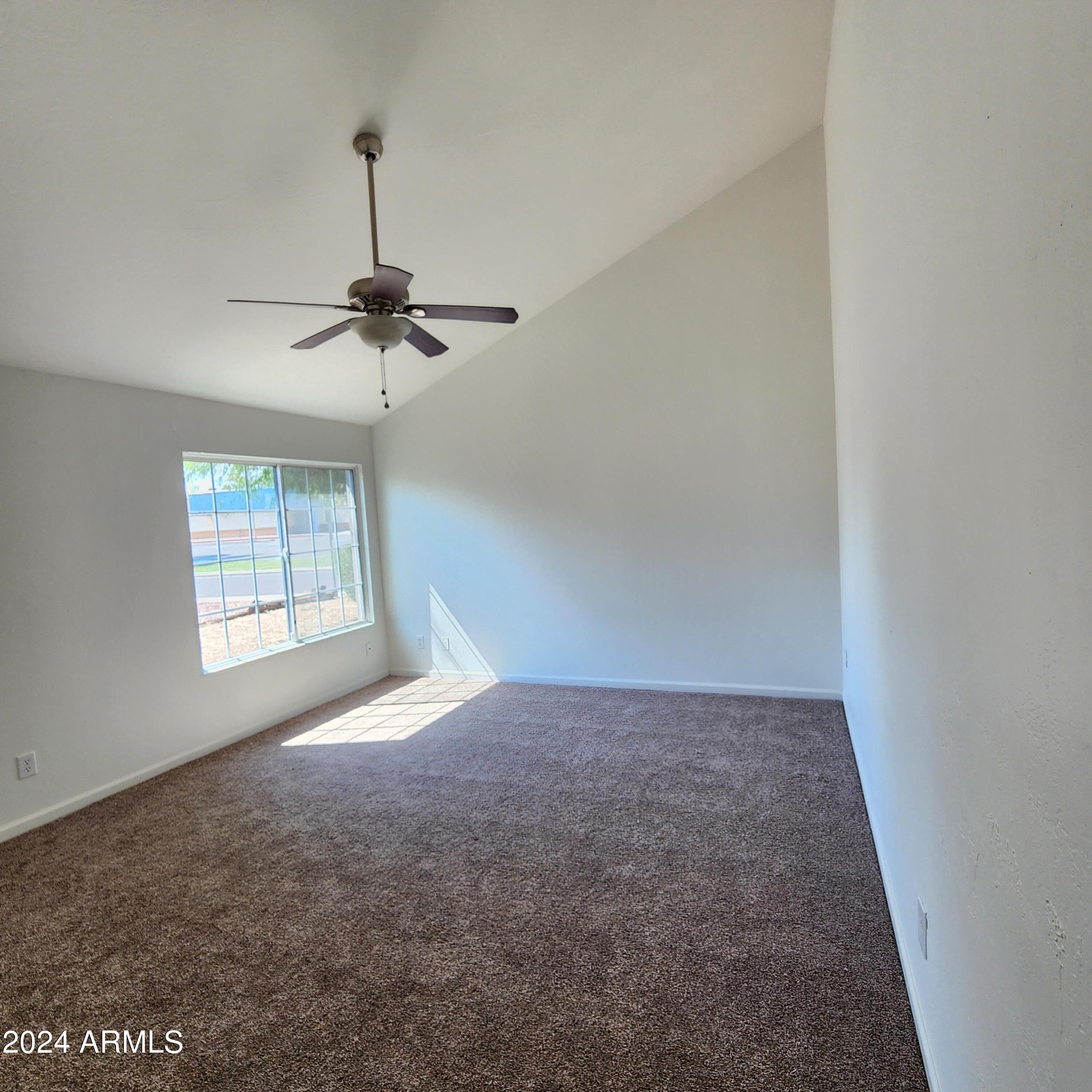 3017 West Yucca Street Phoenix, AZ 85029 - Photo 19 of 32 a view of empty room with ceiling fan