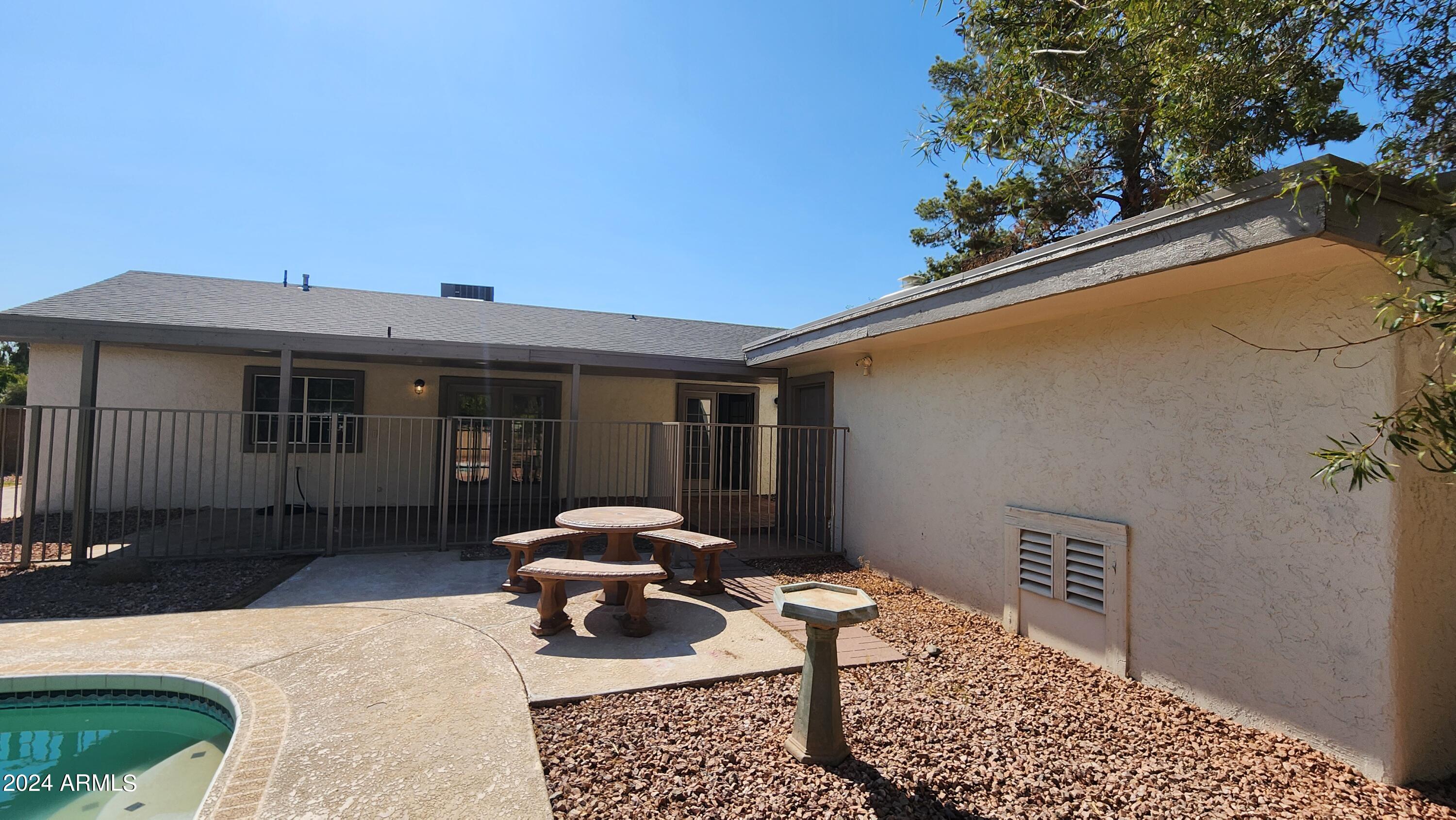 3017 West Yucca Street Phoenix, AZ 85029 - Photo 30 of 32 a front view of a house with garden