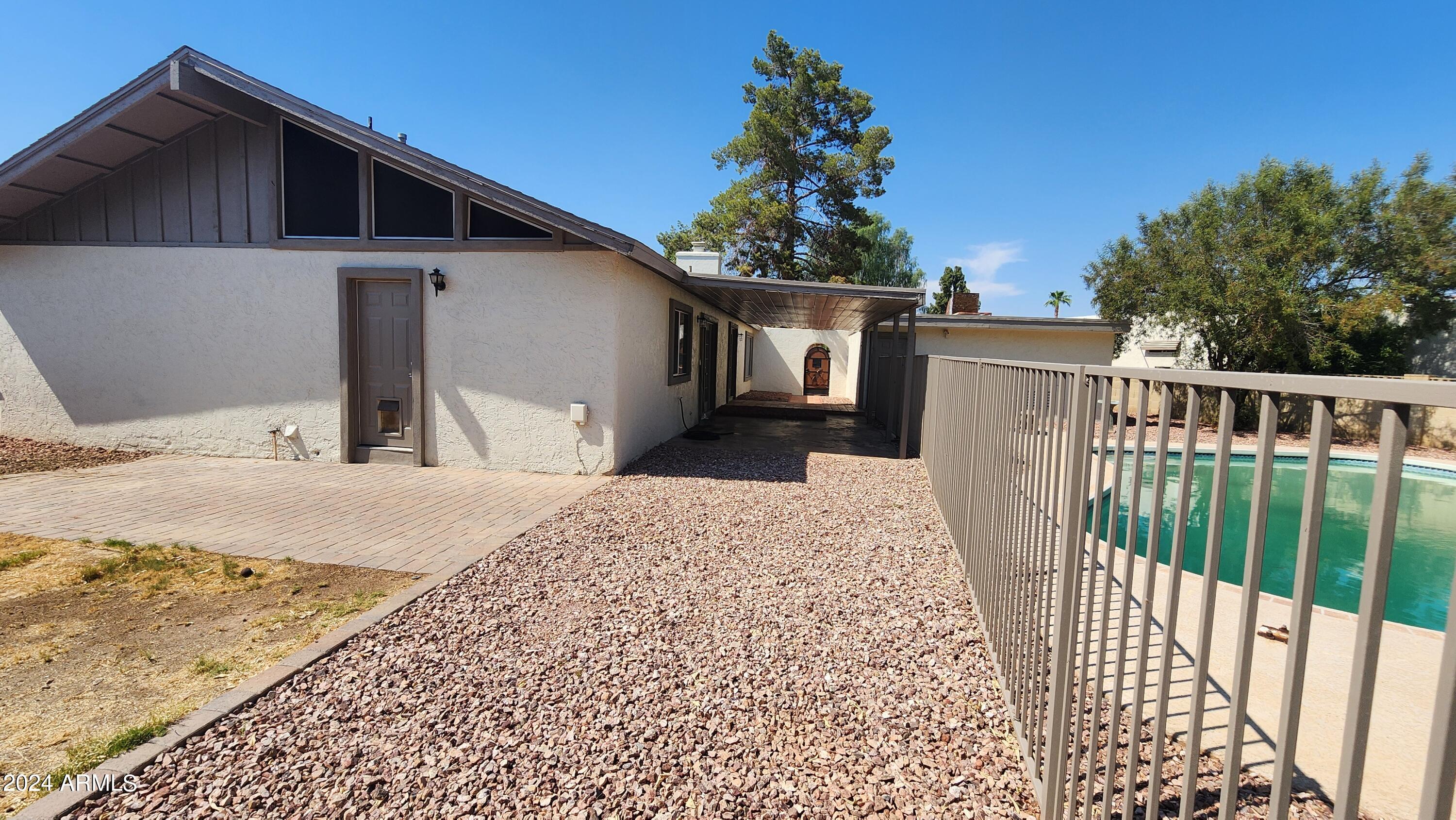 3017 West Yucca Street Phoenix, AZ 85029 - Photo 31 of 32 a view of a house with a yard