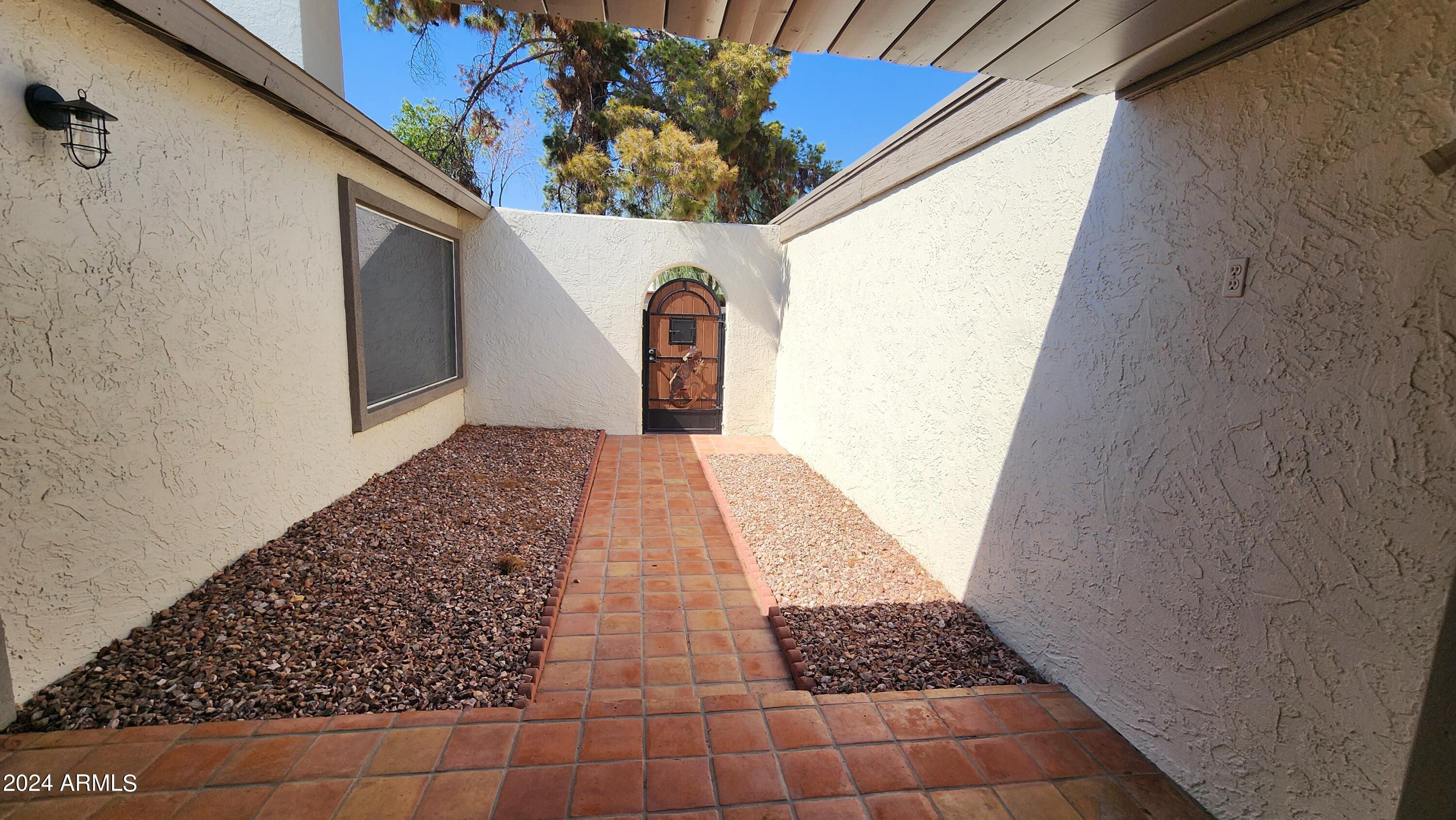 3017 West Yucca Street Phoenix, AZ 85029 - Photo 6 of 32 a bathroom with a sink and a mirror