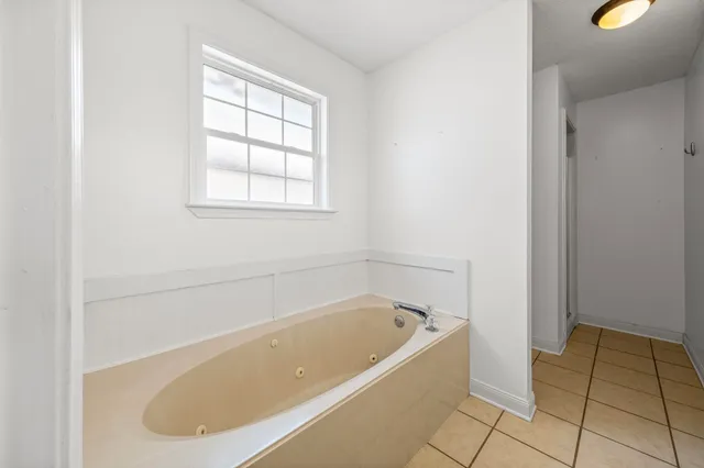 a bathroom with a bathtub