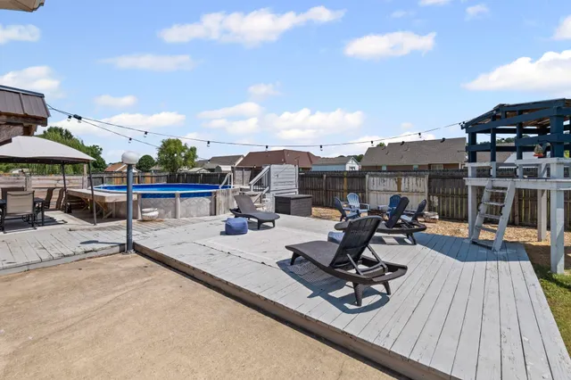 a view of a terrace with sitting area