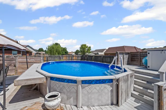 a view of outdoor space and swimming pool
