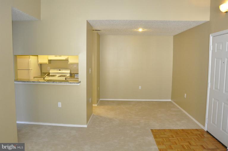 21029 Timber Ridge Terrace, Unit 304 Ashburn, VA 20147 - Photo 10 of 20 Dining Room Features New Carpet & New Paint