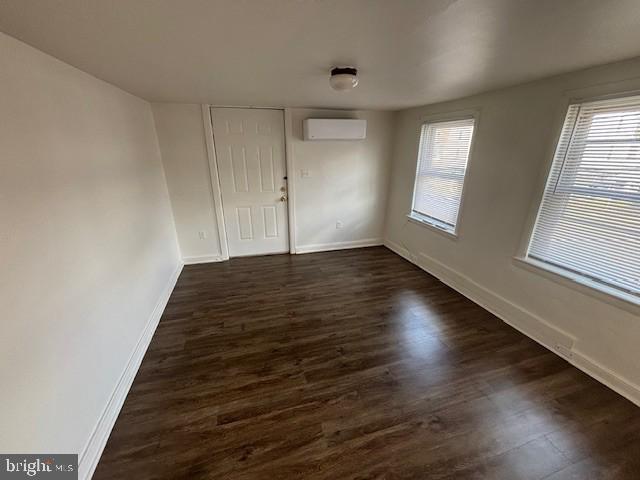 90 South Main Street Dover, PA 17315 - Photo 3 of 5 wooden floor in an empty room with a window