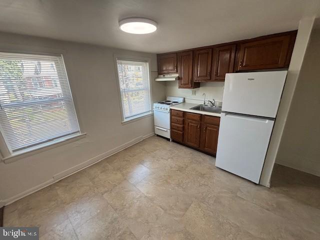 90 South Main Street Dover, PA 17315 - Photo 3 of 5 a kitchen with sink cabinets and refrigerator