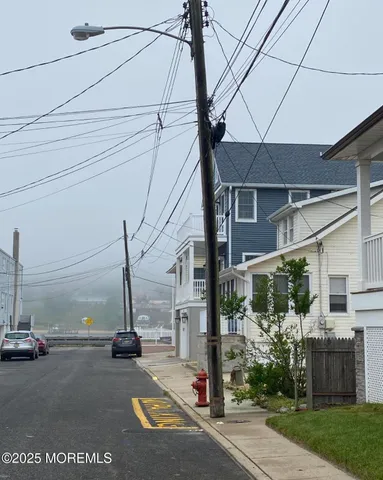a view of a street with cars