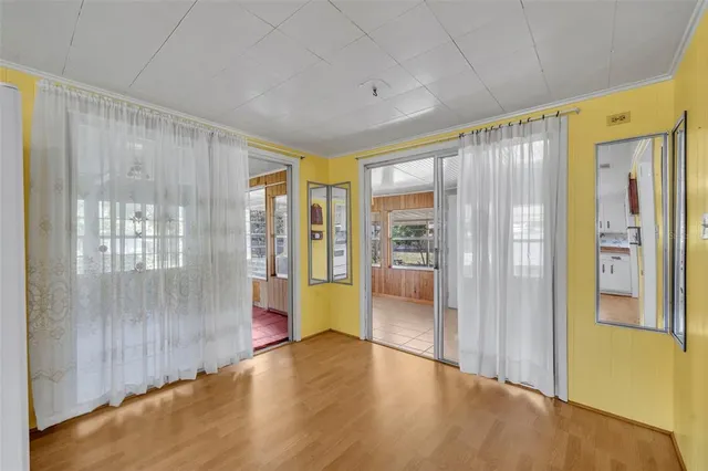 a view of entryway with wooden floor