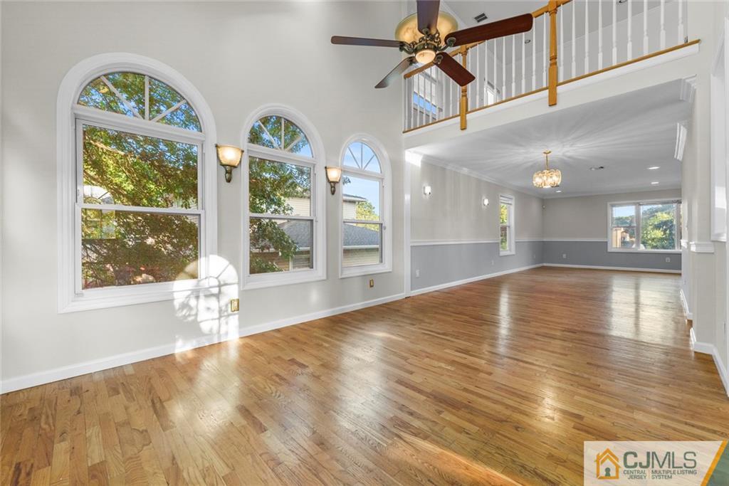 33 Hazel Avenue Edison, NJ 08820 - Photo 13 of 52 a view of an entryway with wooden floor and a window