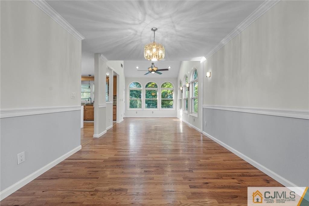 33 Hazel Avenue Edison, NJ 08820 - Photo 15 of 52 wooden floor in an empty room with a window