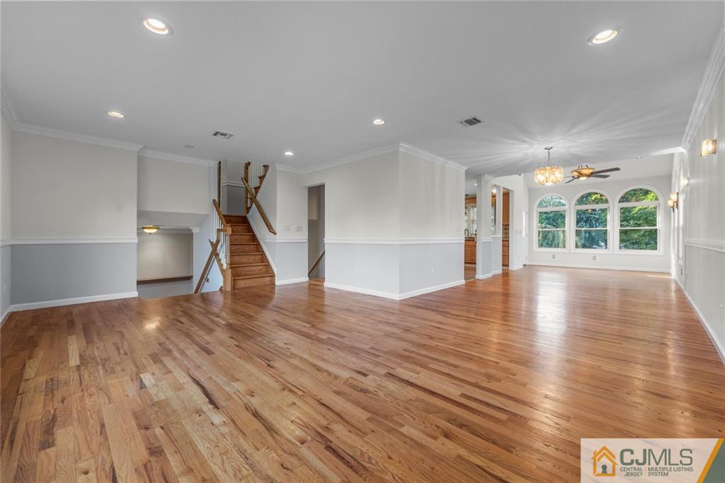 33 Hazel Avenue Edison, NJ 08820 - Photo 16 of 52 a view of an empty room with wooden floor and a window